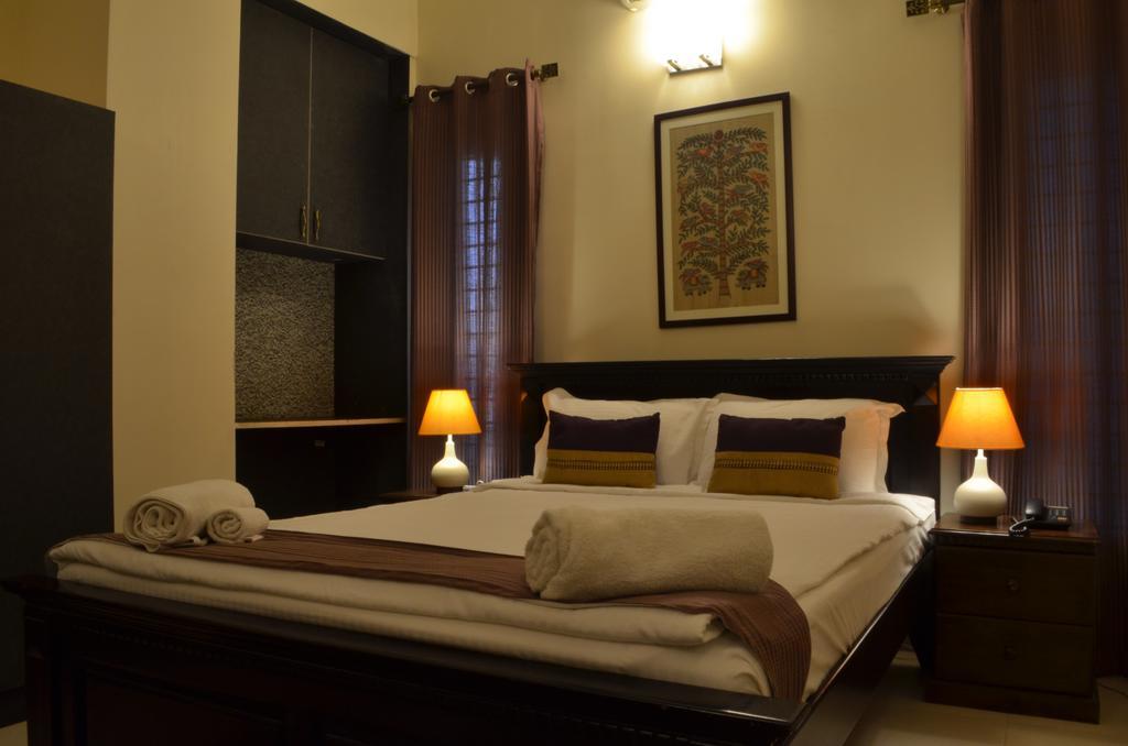 Luxtay Suites Bangalore Rom bilde