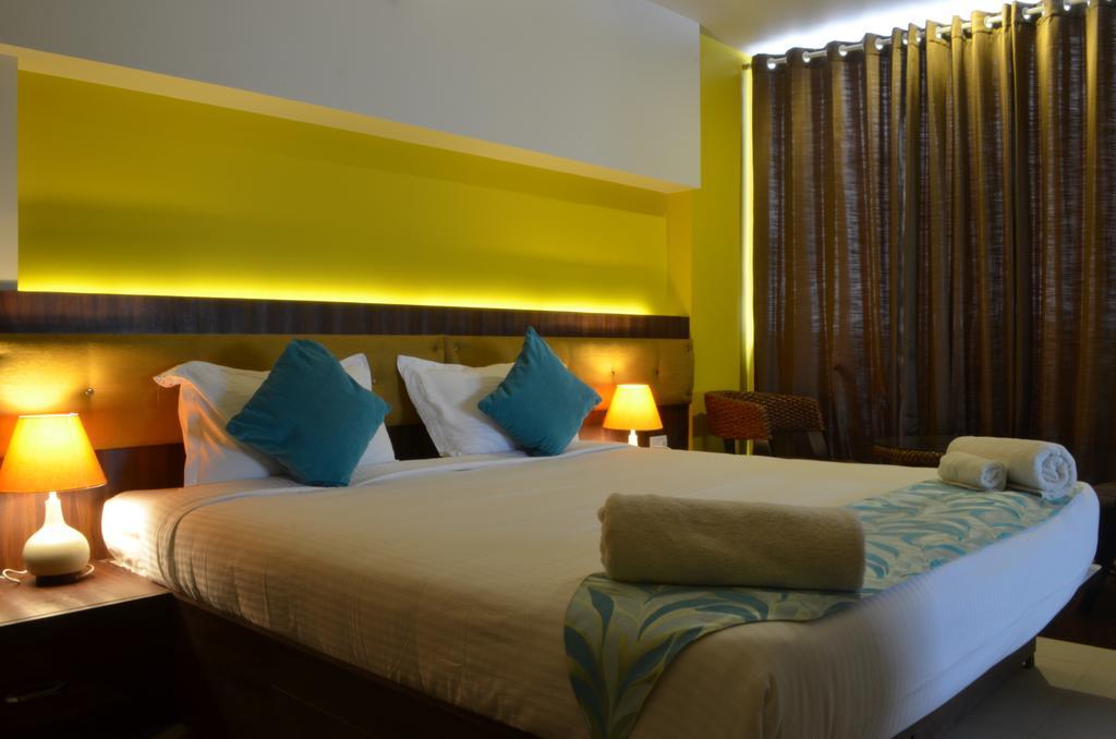 Luxtay Suites Bangalore Rom bilde
